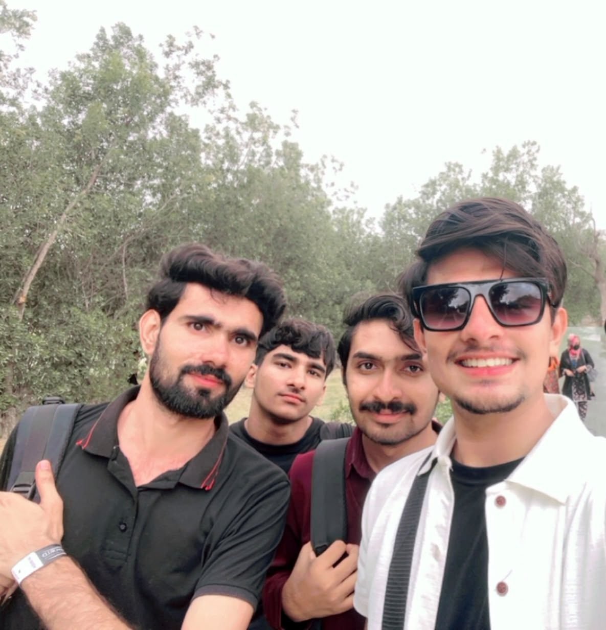 Picnic with friends Group photo of four friends at an Aptech picnic outing
